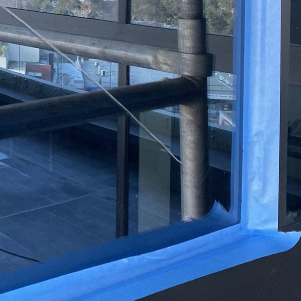 J.Racenstein Polishing Kit, product image showing glass surface with cleaned and polished areas to remove stains and light scratches.