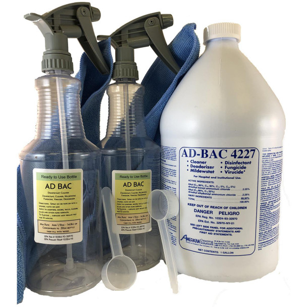 J.Racenstein Kit Ad-Bac Ready to Use, disinfectant and cleaner bottles with spray nozzles, cleaning cloth, and a gallon container of disinfectant solution for hospital and institutional use.