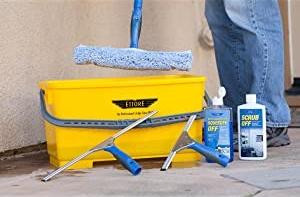 Ettore Squeegee Off Soap, cleaning tools including a squeegee, scrubber, and cleaning spray bottle with a yellow bucket in the background.
