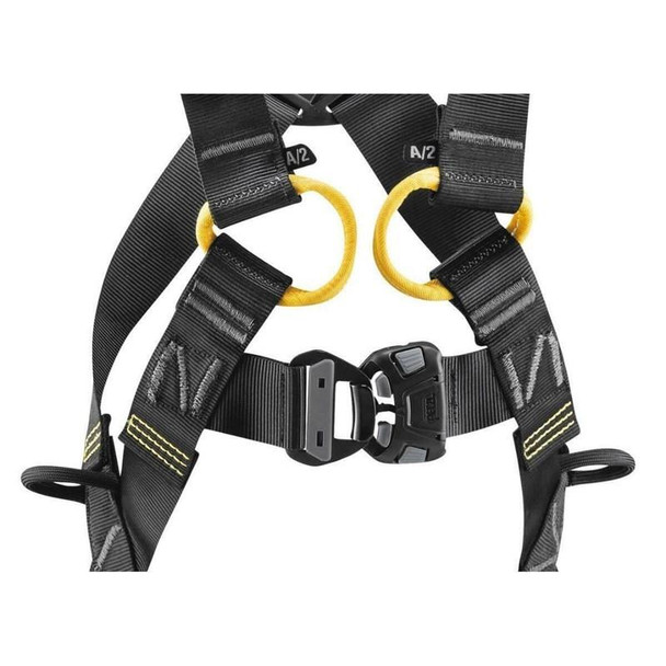Petzl Newton ANSI/CSA Body Harness, a safety harness with adjustable straps, padded waist belt, yellow reinforced attachment points, and a quick-release buckle for climbing and work at height safety.
