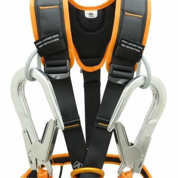 J.Racenstein Itaka Harness Kong, safety harness with adjustable black straps, orange accents, metal carabiners, and padding for secure pet restraint.