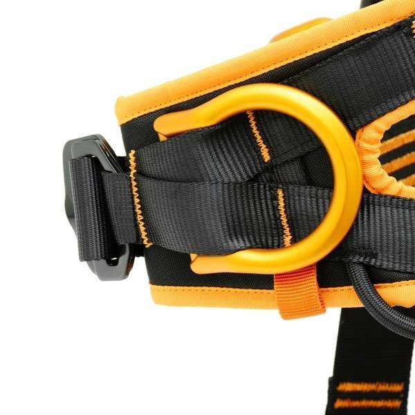 J.Racenstein Itaka Harness Kong, a sturdy black and orange dog harness with a yellow D-ring and adjustable strap for secure fitting.