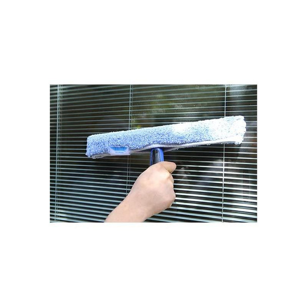 Ettore ProGrip Washers, a person using a squeegee with a blue handle to clean glass window panels.
