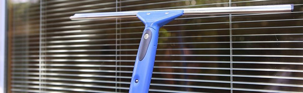 Ettore Squeegee Super System 18in Complete, window cleaning tool with an extended handle cleaning window blinds.
