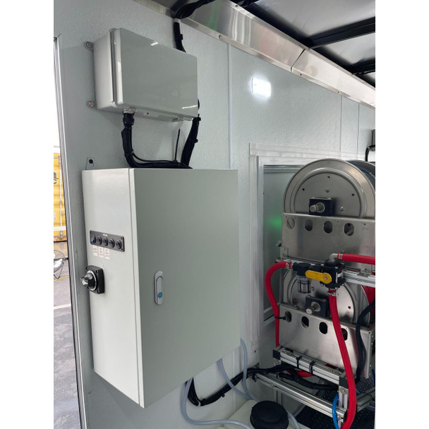 ProTool Enclosed Pressure and Soft Washing Drone Trailer, image of the equipment panel and components inside the trailer used for drone-based pressure washing