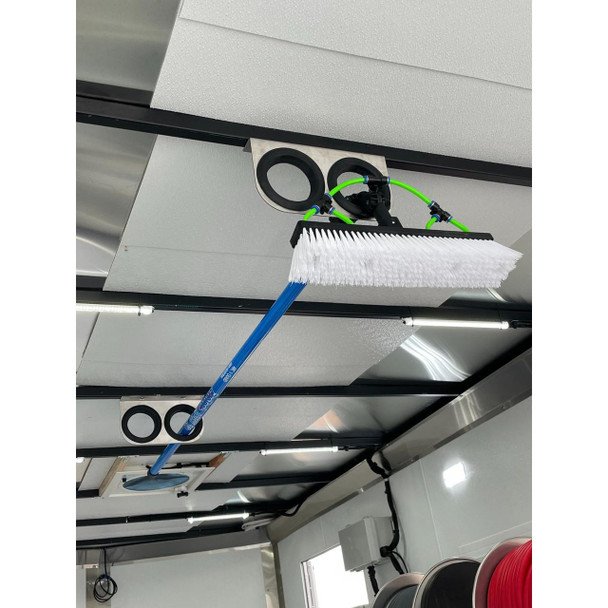 ProTool Enclosed Pressure and Soft Washing Drone Trailer, mounted on ceiling with attached cleaning brush and hoses for drone-based pressure and soft washing applications.