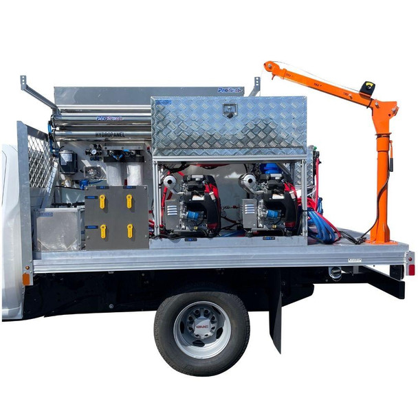 ProTool Drone Pressure Washing Flatbed Skid, industrial pressure washing equipment mounted on a utility truck with hydraulic robotic arm and dual pressure systems.