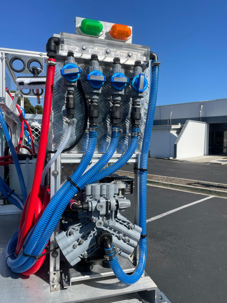 ProTool Drone Pressure Washing Flatbed Skid, industrial pressure washing system with multiple hoses, valves, and gauges for cleaning and maintenance.