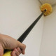 Ettore Cobweb Duster with 9ft Pole, extended duster with yellow cleaning head reaching high corner.