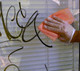 J.Racenstein Graffiti Safewipes pack of 250 Wipes, hand wearing glove cleaning graffiti off a window.