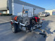 ProTool Small Dual User Pressure Washing Trailer 8gpm, a mobile pressure washing unit with hoses, water tanks, and powerful equipment on a trailer for commercial cleaning applications.