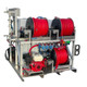 ProTool HydroStation Pure Water Skid, industrial water purification system with red hoses, pumps, and metallic frame.