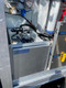 ProTool Drone Pressure Washing Flatbed Skid, industrial cleaning equipment with water filtration system, bypass and suction controls, and various hoses and valves.