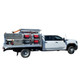 ProTool Drone Pressure Washing Flatbed Skid, a work truck with mounted pressure washing equipment including hoses and tanks.