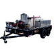ProTool Commercial Hot Water Pressure Washing Trailer, industrial equipment with water tanks, hoses, fuel engine, and storage compartments on a dual-axle trailer for commercial pressure washing services.