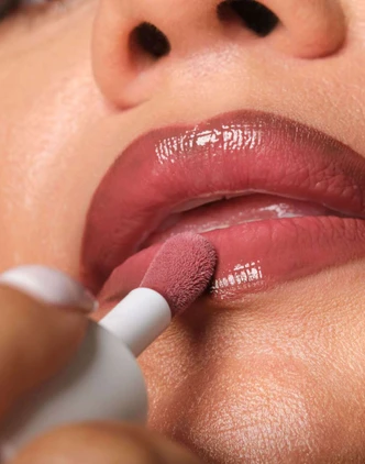 Putty Pure Gloss Balm Lip Colour on model