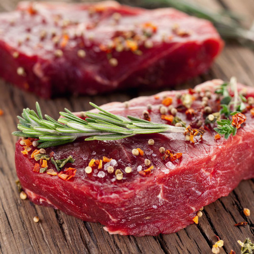 Two sirloin steaks, prepped and ready to cook