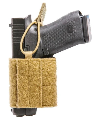Hook and loop holster with firearm installed and retention strap