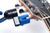 MusicNomad GRIP ONE All-In-1 String Winder Cutter Puller on acoustic