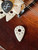 Optima Wolle Nature White Mandolin Pick  front