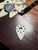 Optima Wolle Nature White Mandolin Pick  side