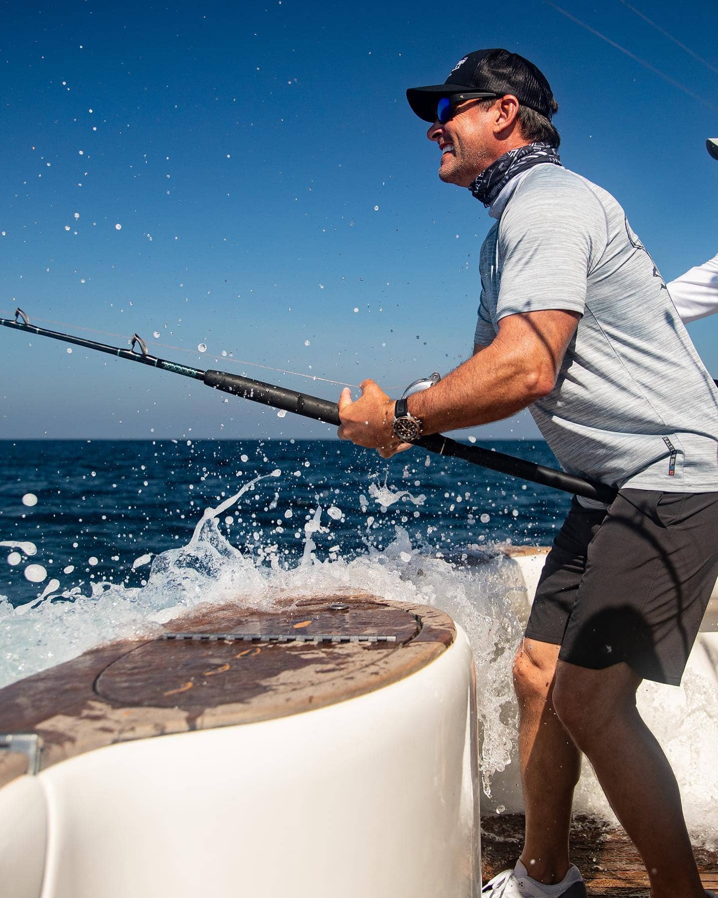 An offshore angler fighting a game fish