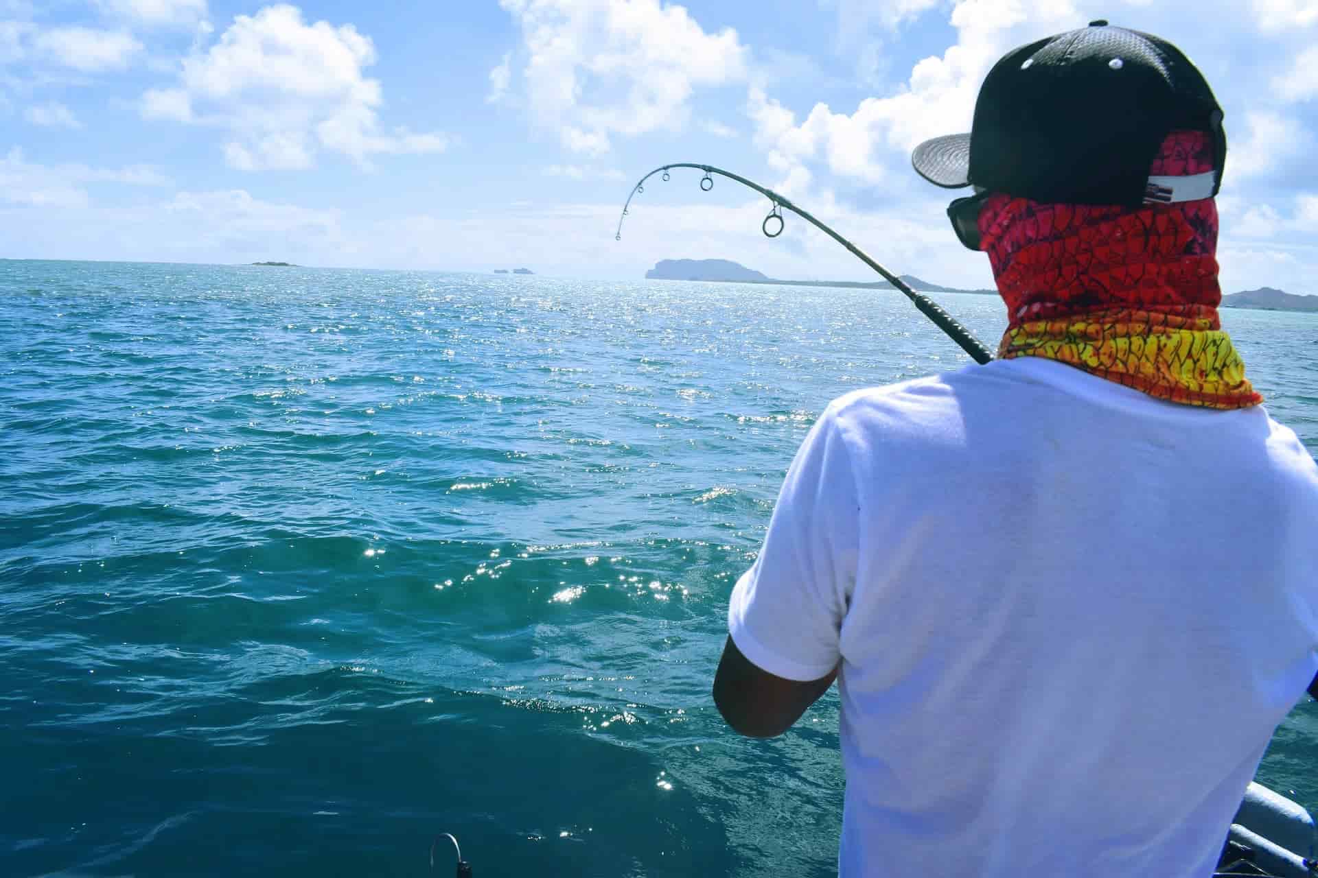 An offshore angler fishing at sea