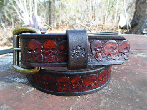 Leather belt with skulls embossed.