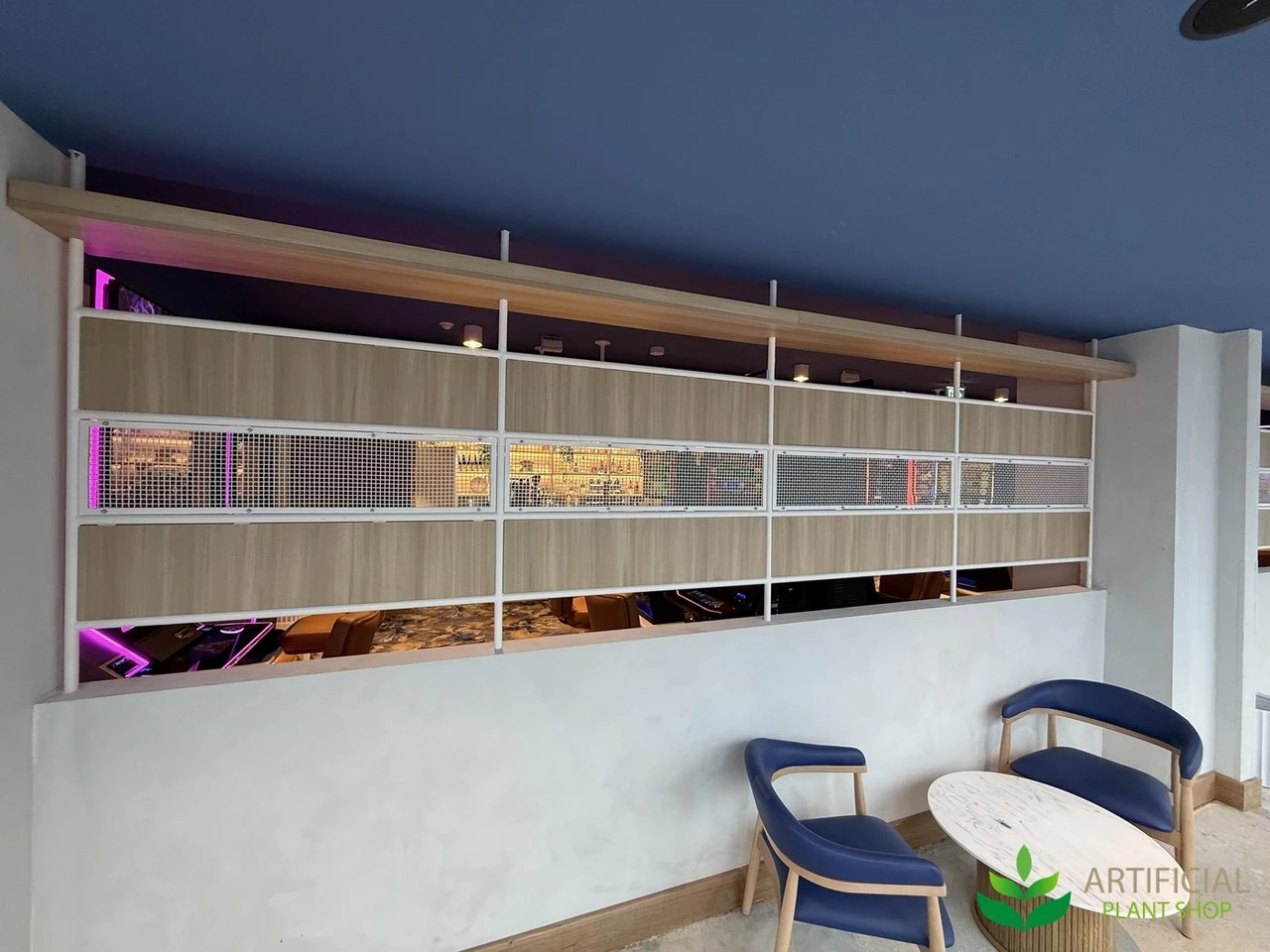 venue partition wall before artificial hanging greenery was installed