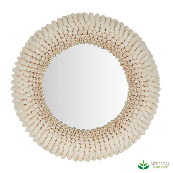 round mirror with frame made of sea shells