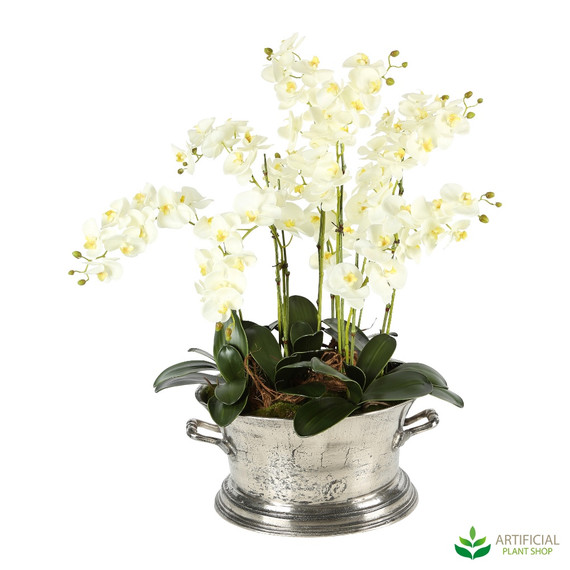 artificial orchid arrangement in steel tub planter