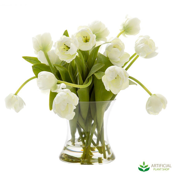 artificial tulips in a glass vase