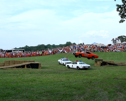 Autographed by Ben Jones 2012 Homecoming Jump Photo (8x10)