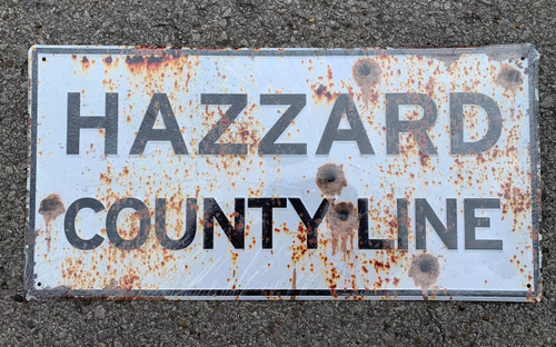 Autographed by Ben Jones - Rustic Hazzard County Line Sign w/Bullet Holes 12x24