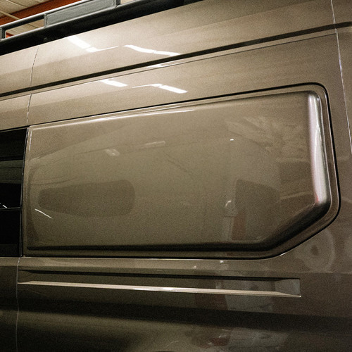 Solid Flarespace flare on a Ford Transit 148, painted to match