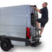Climbing the Surco No-Drill ladder on a Sprinter rear door