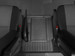 WeatherTech black center aisle FloorLiner installed between the Sprinter front seats