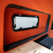 Flarespace flare with trim ring and window in a finished Transit interior