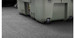 Heavy tool case sitting on the Guardian Impact floor mat
