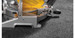 Miter saw sitting on the Guardian Comfort cargo mat