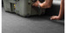 Skid-resistant ImpactCore surface holding a tote in place