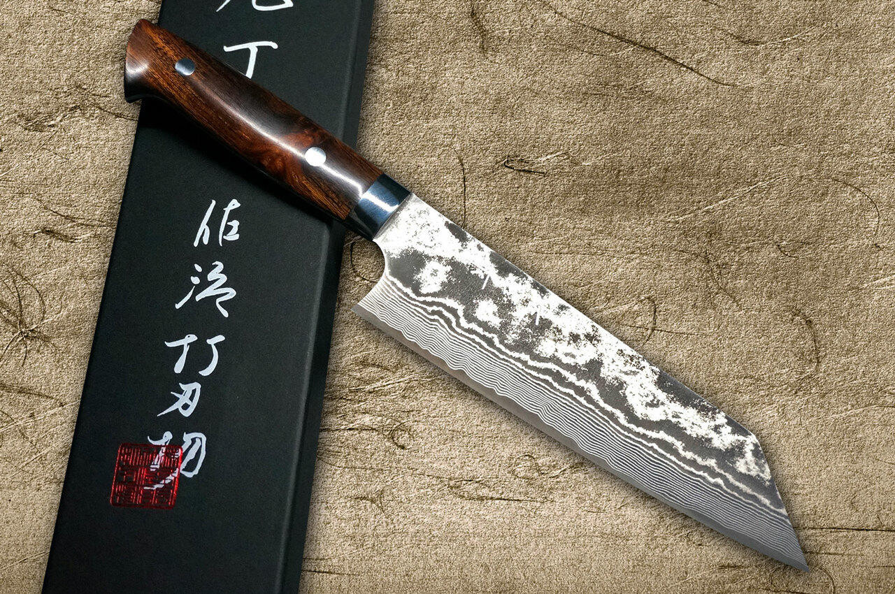 https://cdn11.bigcommerce.com/s-attnwxa/images/stencil/1280x1280/products/3539/192839/takeshi-saji-vg10-black-damascus-ir-japanese-chefs-bunka-knife-180mm-with-desert-ironwood-handle__97520.1645616286.jpg?c=2