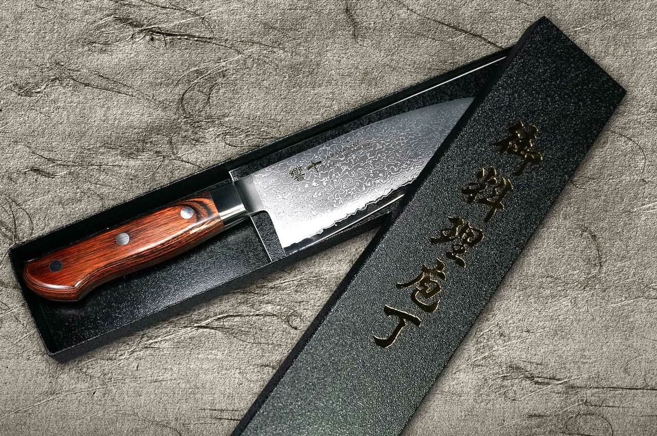 https://cdn11.bigcommerce.com/s-attnwxa/images/stencil/original/products/1930/180776/tamahagane-tamahagane-kyoto-63-layer-damascus-wood-handle-japanese-chefs-western-deba-170mm__51118.1632911418.jpg?c=2&imbypass=on&imbypass=on