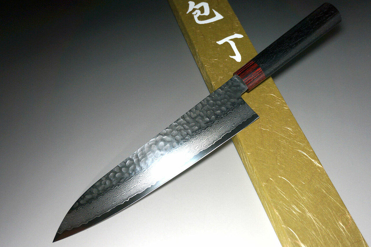 https://cdn11.bigcommerce.com/s-attnwxa/images/stencil/original/products/2253/180376/iseya-iseya-i-series-33-layer-vg-10-damascus-hammered-japanese-chefs-gyuto-knife-210mm__62427.1632910743.jpg?c=2&imbypass=on&imbypass=on