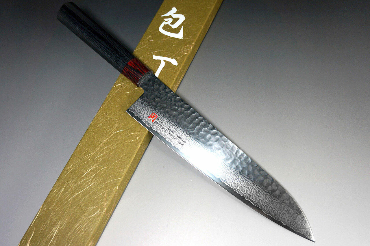 https://cdn11.bigcommerce.com/s-attnwxa/images/stencil/original/products/2253/181935/iseya-iseya-i-series-33-layer-vg-10-damascus-hammered-japanese-chefs-gyuto-knife-210mm__60763.1632913203.jpg?c=2&imbypass=on&imbypass=on