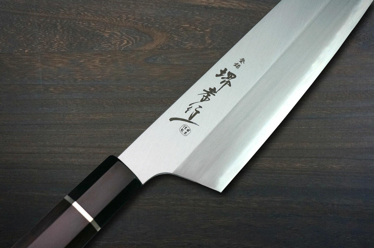 https://cdn11.bigcommerce.com/s-attnwxa/images/stencil/original/products/2307/181614/sakai-takayuki-sakai-takayuki-homura-premium-aogami-2-steel-japanese-chefs-kengata-gyuto-knife-225mm__57064.1632912701.jpg?c=2&imbypass=on&imbypass=on