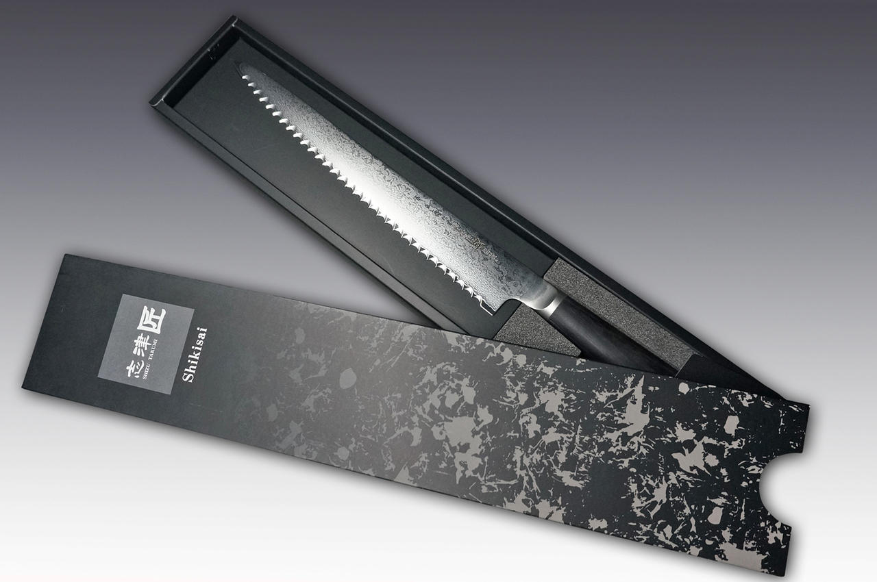 https://cdn11.bigcommerce.com/s-attnwxa/images/stencil/original/products/3496/189900/shizu-shikisai-miyako-33-layer-damascus-aus8-japanese-chefs-bread-slicer-240mm__03314.1639119904.jpg?c=2&imbypass=on&imbypass=on