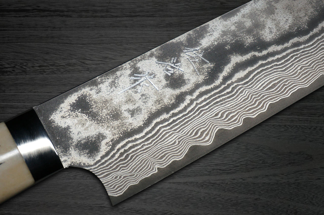 https://cdn11.bigcommerce.com/s-attnwxa/images/stencil/original/products/3661/192806/takeshi-saji-vg10-black-damascus-dhw-japanese-chefs-gyuto-knife-210mm-with-white-antler-handle__35962.1645616260.jpg?c=2&imbypass=on&imbypass=on