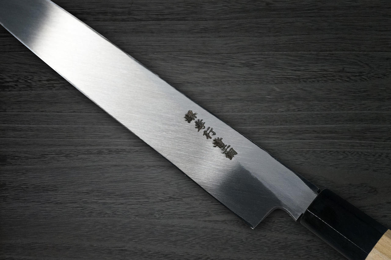 https://cdn11.bigcommerce.com/s-attnwxa/images/stencil/original/products/3757/171220/sakai-takayuki-sakai-takayuki-aoniko-blue-2-steel-mirror-finish-japanese-chefs-deba-knife-180mm__65922.1627545105.jpg?c=2&imbypass=on&imbypass=on