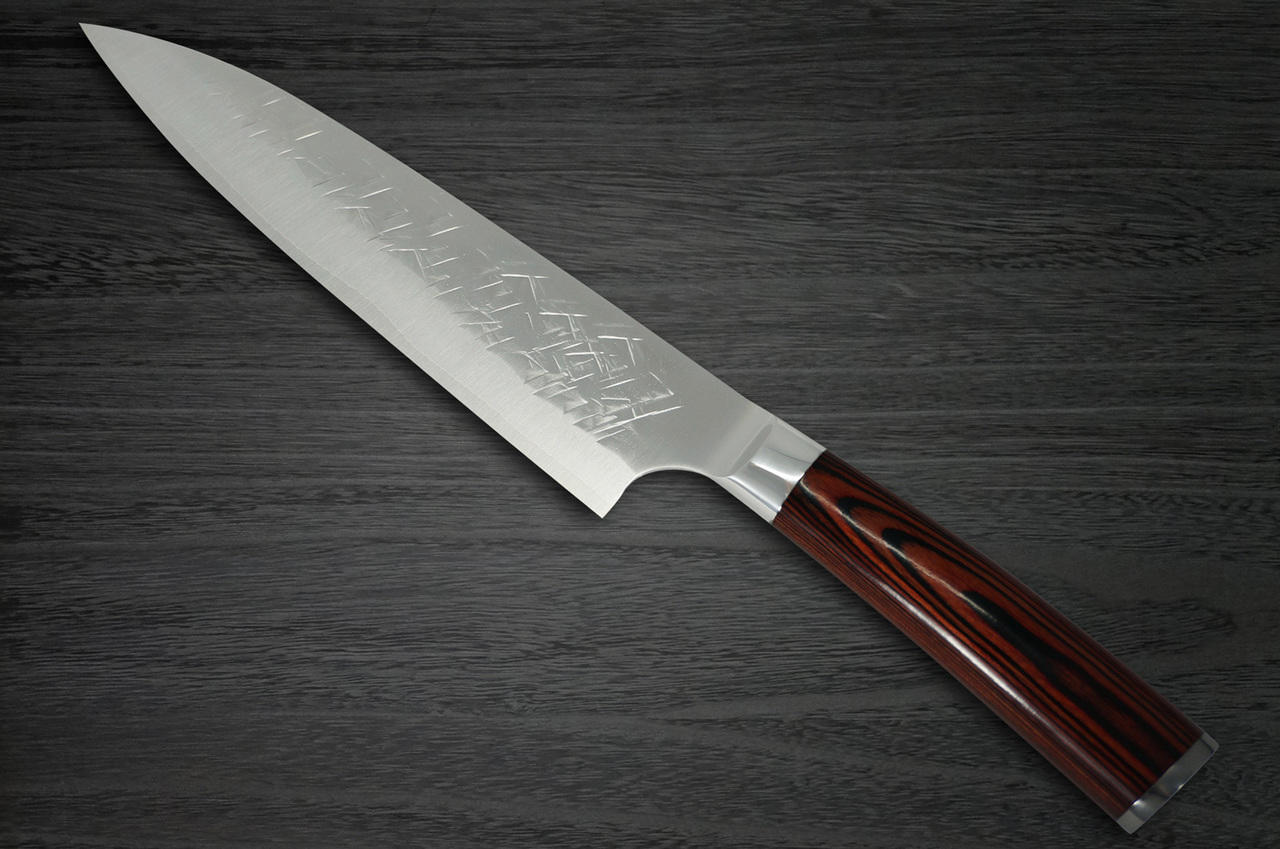 https://cdn11.bigcommerce.com/s-attnwxa/images/stencil/original/products/4023/166495/takeshi-saji-takeshi-saji-srs13-mirror-hammered-pwr-japanese-chefs-gyuto-knife-210mm-with-red-pakka-wood-handle__13161.1624952058.jpg?c=2&imbypass=on&imbypass=on
